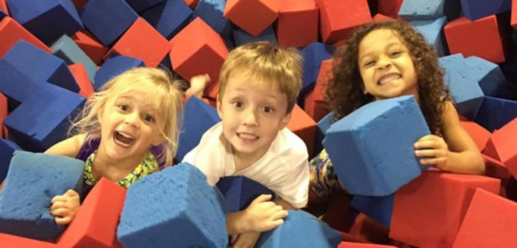 Children play in the foam pit