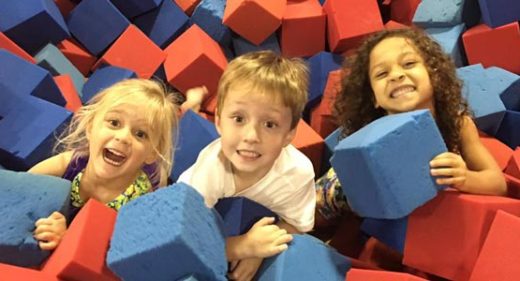 Children play in the foam pit