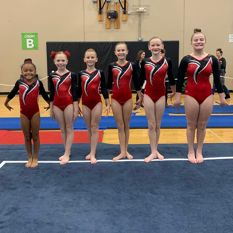 Gymnastics Team Competes at MakeAWish Meet Gem City Gymnastics